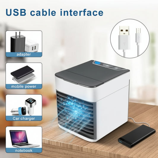 Portable air conditioner with USB cable interface on a wooden surface