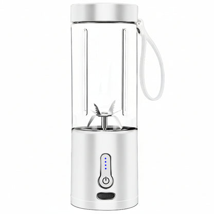 Portable blender with a white base and clear container on a white background