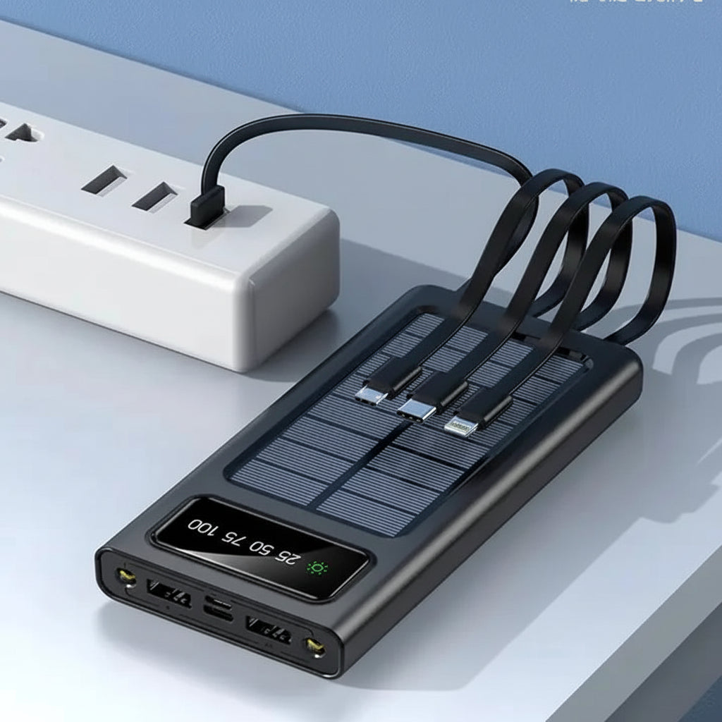 Black electronic device with solar panel and digital display on a light gray surface.